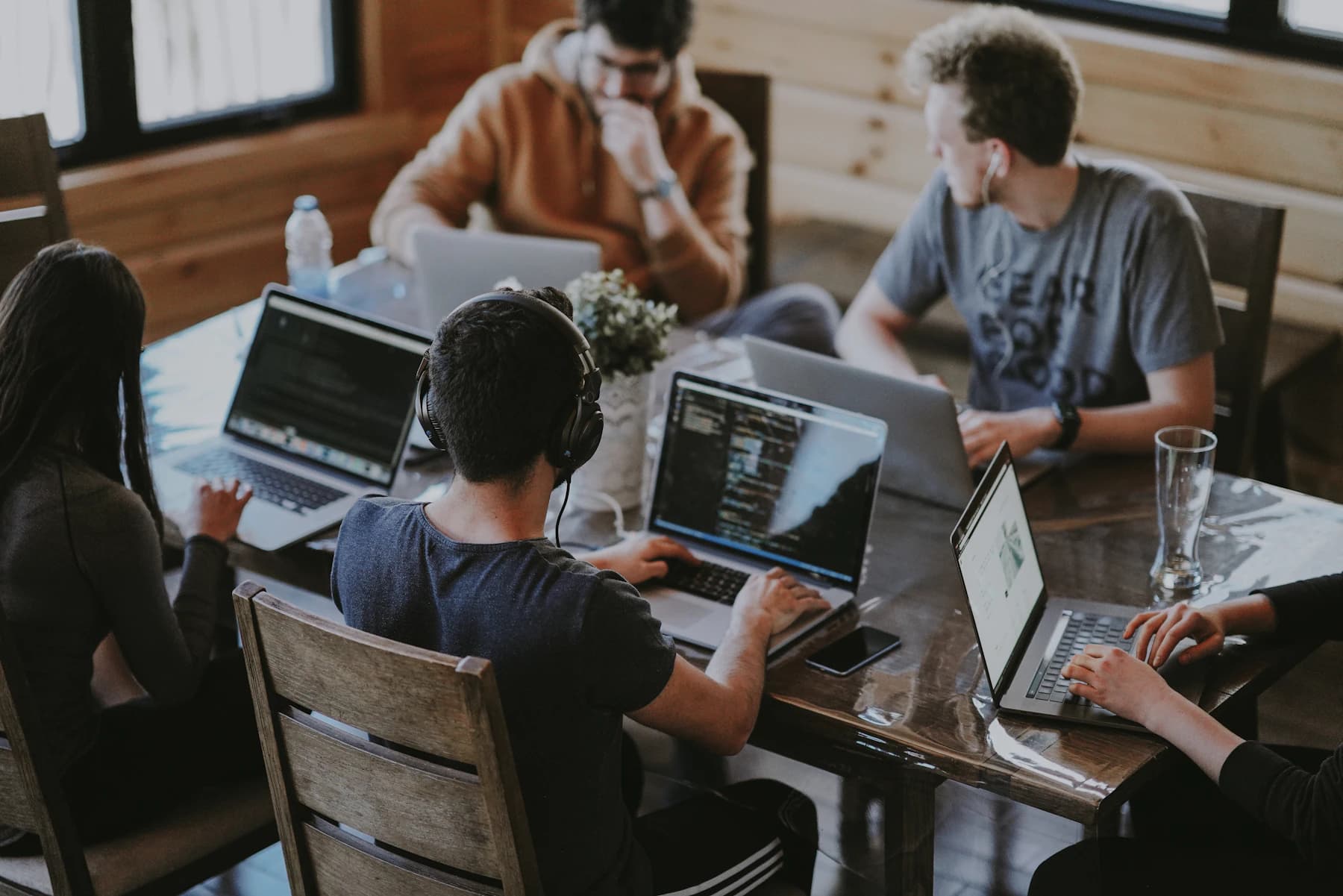 Cross-functional team collaborating in a professional workspace